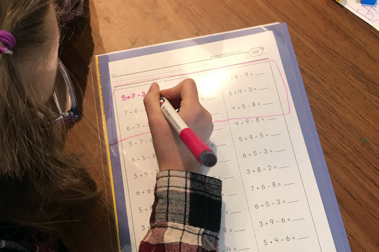 Using a dry erase marker to practice math facts