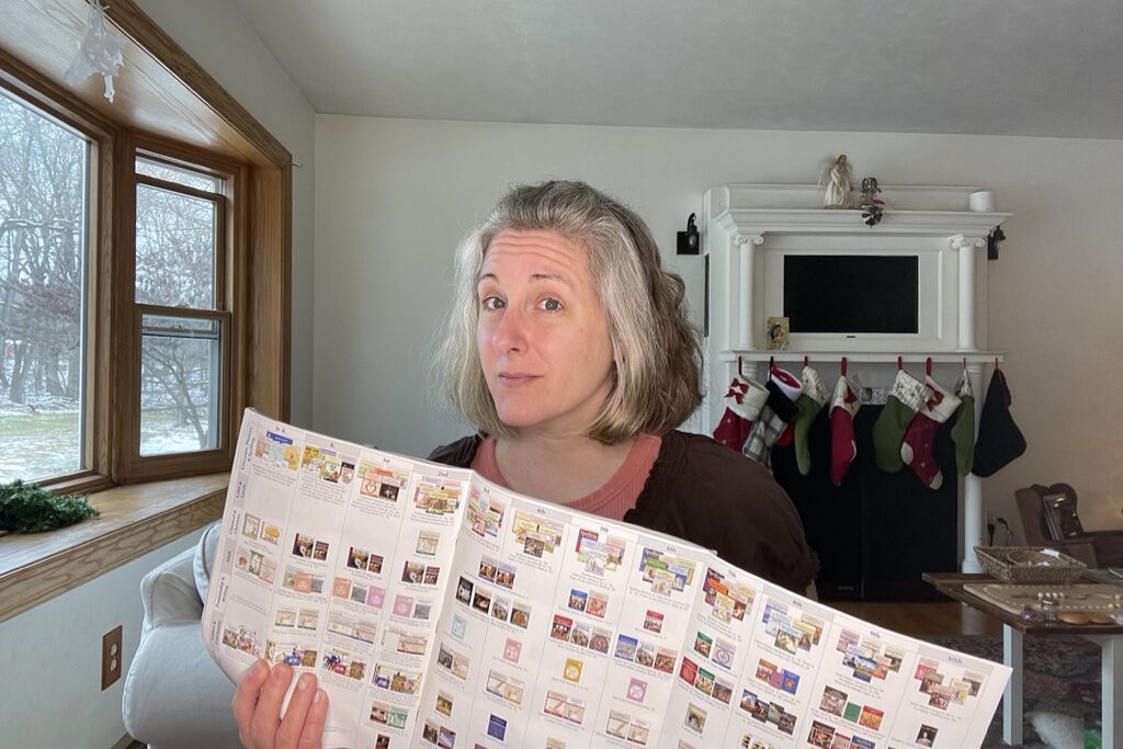 Homeschool mom with Memoria Press catalog